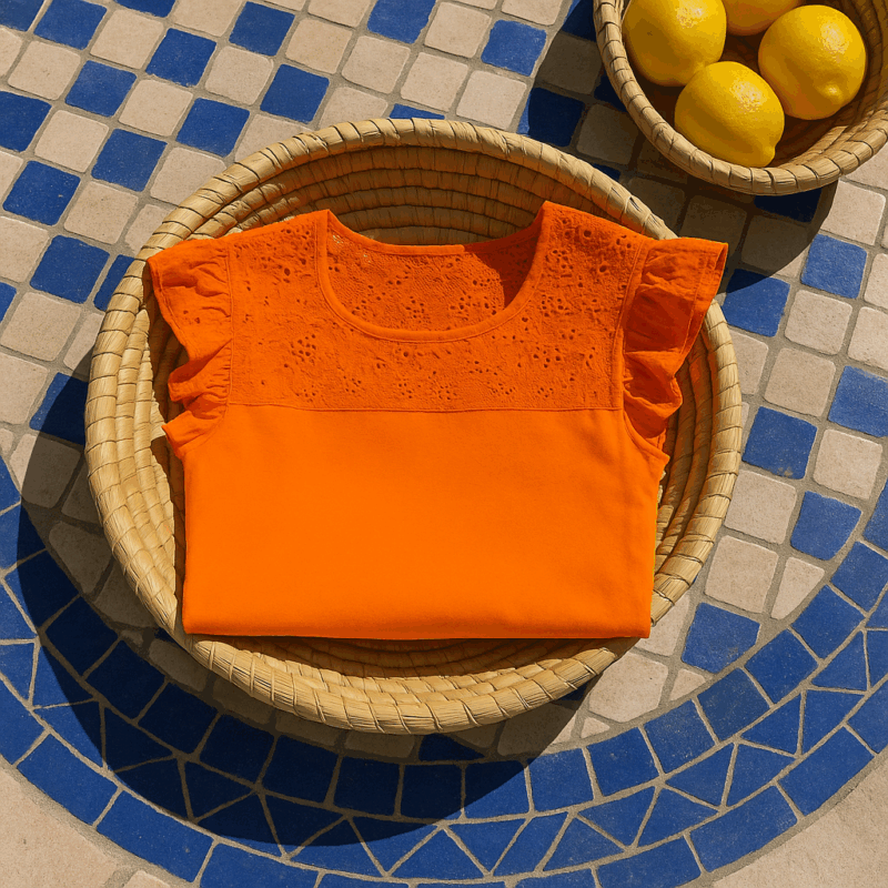 collection mode vacances en italie été 2025 top orange à dentelle