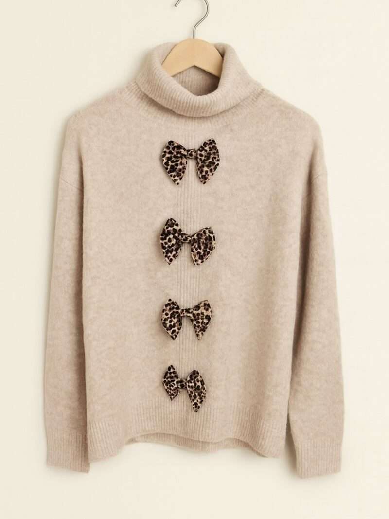 Pull col roulé nœuds léopard