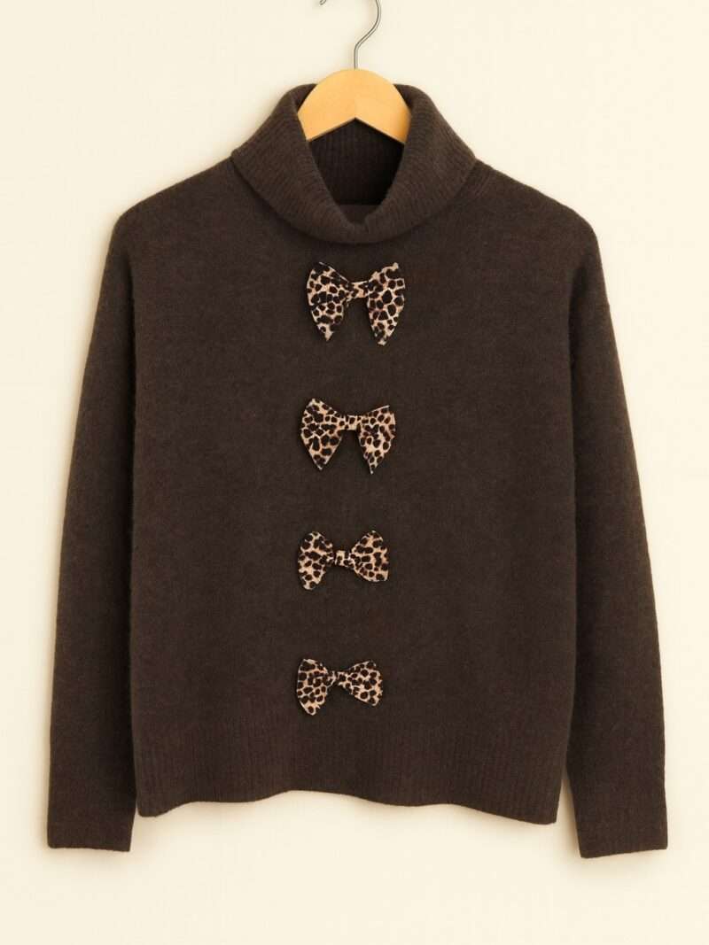 Pull col roulé nœuds léopard