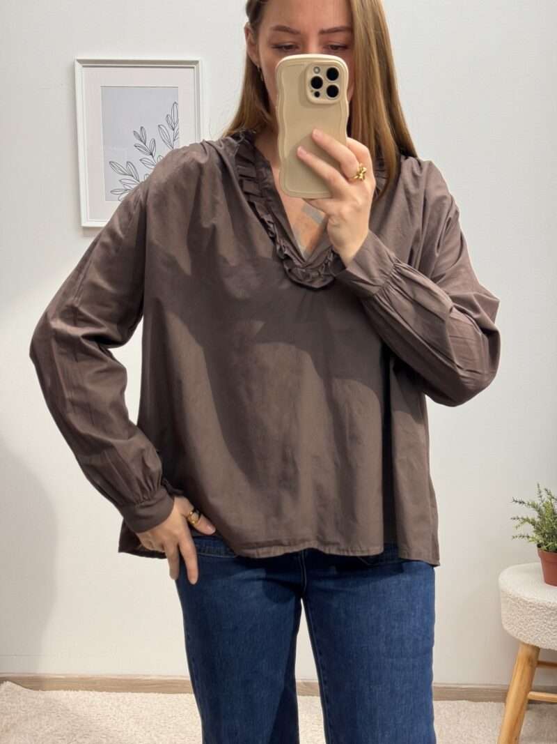 Blouse col v à froufrous